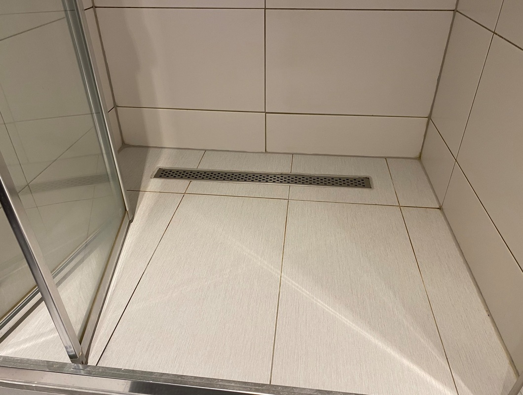 Oprava dlažby ve sprchovém koutu